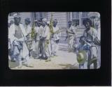 Korean Coolies (Showing racks for carrying baggage as seen on arrival of ship at Pusan, Korea)