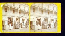 [Group of people in front of building]