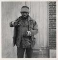 [Man with cigarette box, Buffalo, New York]