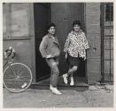 [Two young women in doorway, Buffalo, New York]