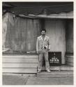 [Man in front of Buffalo News box, Buffalo, New York]