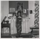 [Woman with white roses, Buffalo, New York]