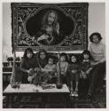 [Mother with six children beneath Jesus tapestry, Buffalo, New York]