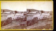 [Houses by railroad tracks]