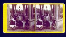 [Children standing under a gazebo]