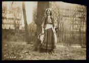 [Elisabeth Freeman dressed as a gypsy, holding a tambourine]