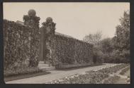 [Stone wall with a gate]
