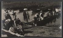[People in hats in boats on river in Mexico]