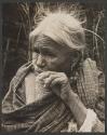 Untitled (Old woman eating)