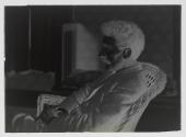 [John Spargo seated at home]
