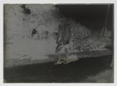 [John Spargo walking, smoking pipe]