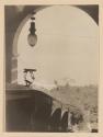 [View of sea framed in doorway]