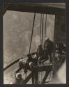 [Men working on mooring mast, Empire State Building]