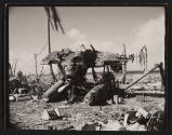 [Remnants of an airplane on coast]