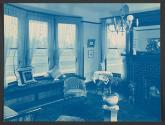 [Interior with bay window and fireplace]