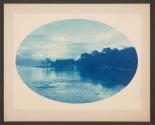 [Shore of lake with building in distance]