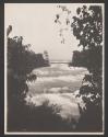 [Bridge to Three Sisters Islands and rapids through trees, Niagara Falls, New York]