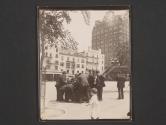 [Group of men and boys in square near Battery Park]