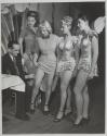 Showgirls Get the Needle