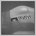 [Close-up of aircraft with rectangular plate with two small stars]