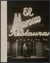 [Manager of El Morocco nightclub standing at front entrance]
