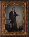 [Man holding lantern]