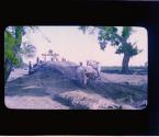 An Indian Well Near Delhi (Water is won from the reluctant soil... The mot of India, like the shadoof and sakkieh of Egypt and the Persian water wheel, is a contrivance born of sun-parched earth and ...)