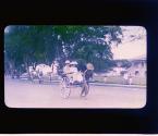 [Chapin and wife in rickshaw]