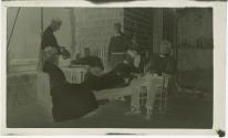 George Eastman and guests on porch, Oak Lodge Trip