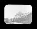 [Soldiers boarding a train]