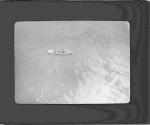 [Ariel view of a boat in water.]