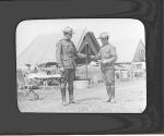 [Maneuver Division staff officer hands message to Lieutenant Foulois]